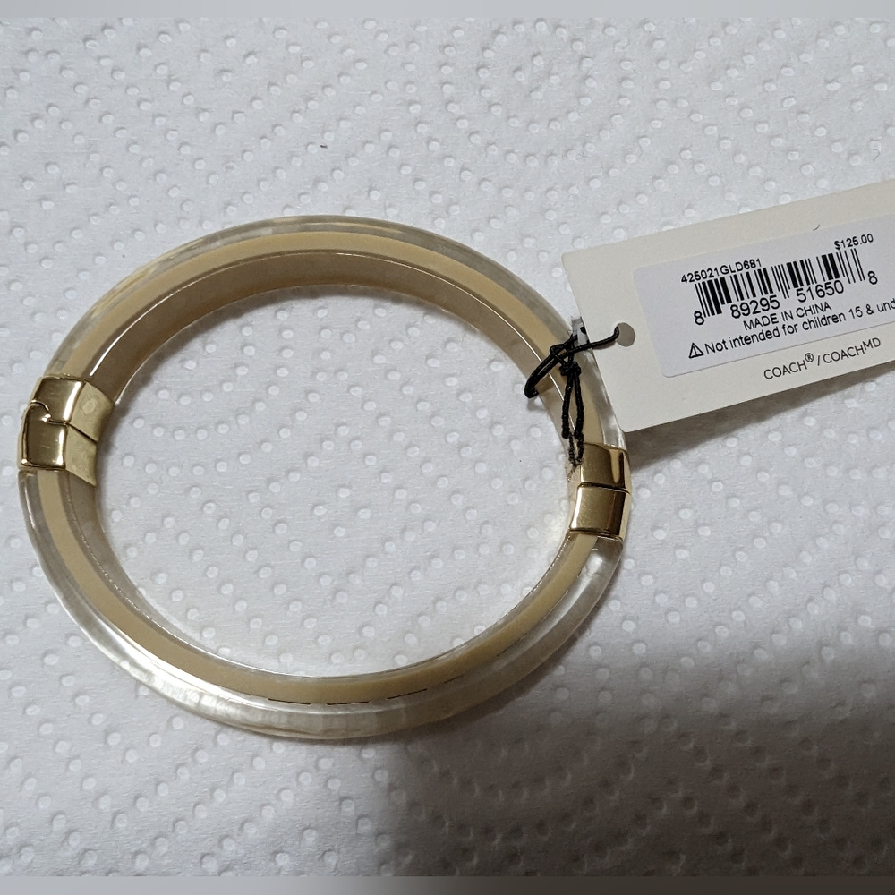 NWT LUCITE CREAM & GOLD COACH BRACELET
ABSOLUTELY SEXY IN SEE THRU - Picture 8 of 11